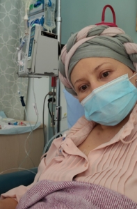Young woman with breast cancer receiving treatment
